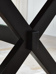 Wildenauer Ashley Furniture counter height butterfly extension table with dark wood finish and sturdy base, shown from the side.