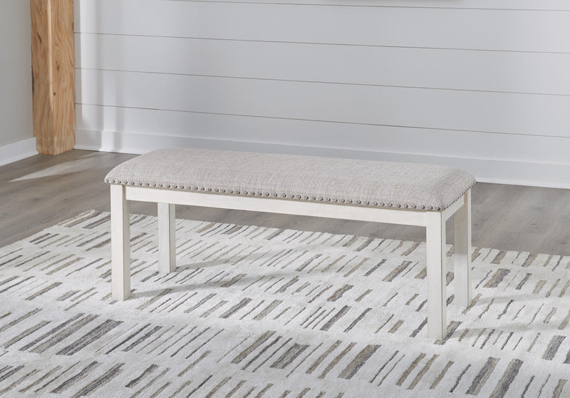 Ashley Furniture Robbinsdale dining package featuring a casual seating set with a table and chairs for stylish dining.