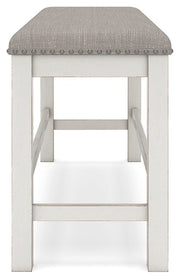 Ashley Furniture Robbinsdale casual dining set featuring a table and chairs with a modern, inviting design.