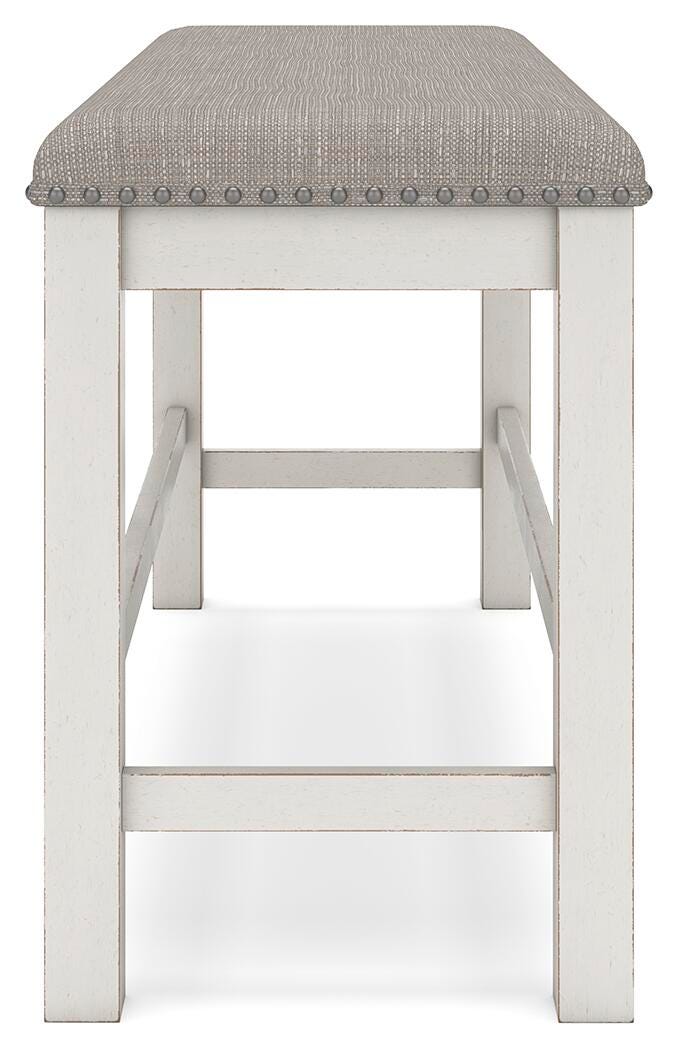 Ashley Furniture Robbinsdale casual dining set featuring a table and chairs with a modern, inviting design.