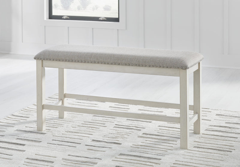 Ashley Furniture Robbinsdale dining package with casual seating set, including dining table and chairs, arranged for outdoor or casual dining.