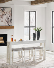 Ashley Furniture Robbinsdale counter height dining table with three matching barstools, featuring a sleek wood finish and modern design.