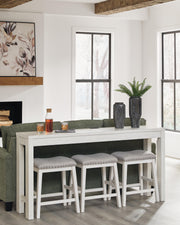 Ashley Furniture Robbinsdale counter height dining table with three matching barstools, featuring a sleek wood finish and modern design.