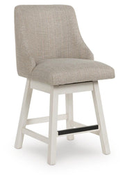 Set of two Robbinsdale counter height barstools by Ashley Furniture, featuring wooden seats and metal legs, angled view.