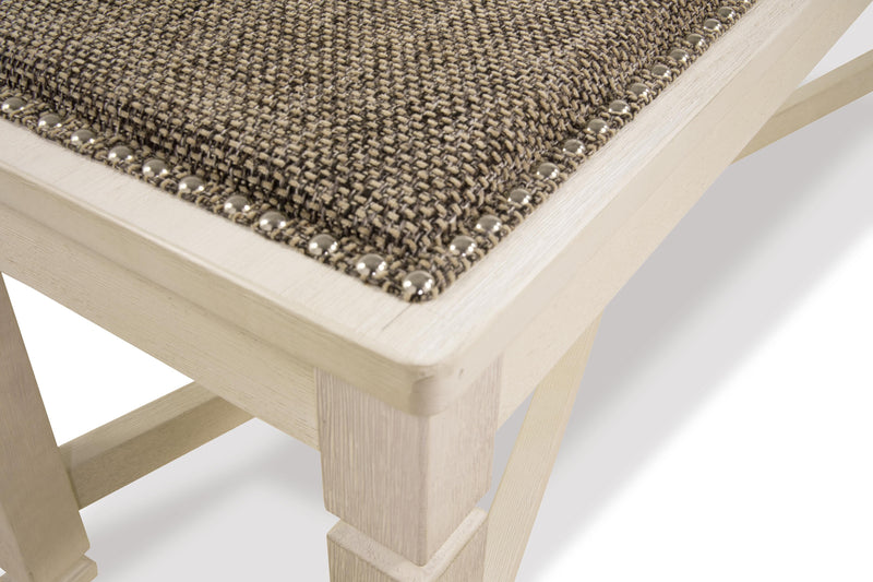 Ashley Furniture Bolanburg Dining Bench with wood finish and upholstered seat, showcasing detailed craftsmanship and sturdy design.