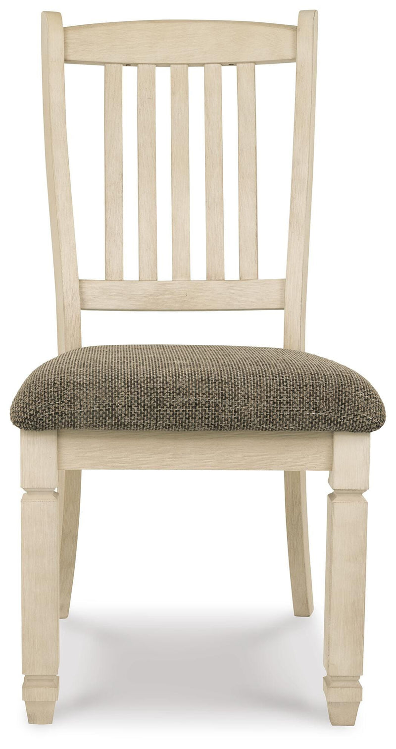 Ashley Furniture Bolanburg dining room set with a rectangular table and six matching chairs, shown from a head-on angle.