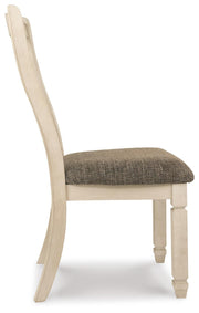 Ashley Furniture Bolanburg dining chair with dark wooden legs and upholstered beige fabric seat, shown from a side angle.