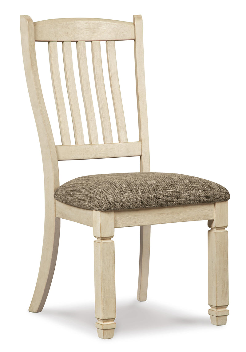Set of six Ashley Furniture Bolanburg dining chairs with dark wood legs and upholstered seats, arranged around a dining table.