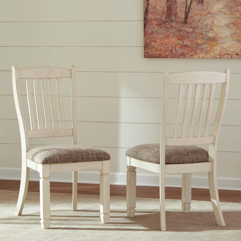 Ashley Furniture Bolanburg dining room set with a wooden table and six matching chairs, perfect for a modern dining space.