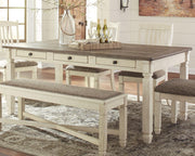 Ashley Furniture Bolanburg dining table with sturdy wooden top and tapered legs, ideal for modern dining rooms.