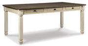 Ashley Furniture Bolanburg dining room set with a wooden table and six matching chairs, featuring a warm finish.