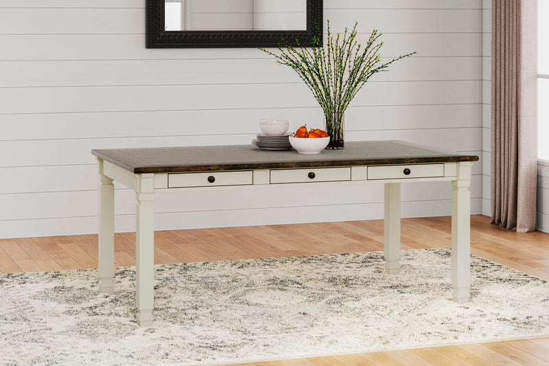 Ashley Furniture Bolanburg dining room set with a wooden table and six matching chairs, featuring a warm, rustic finish.