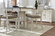 Ashley Furniture Bolanburg counter height dining table with wooden surface and sturdy legs, ideal for casual dining spaces.