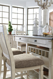Ashley Furniture Bolanburg counter height dining table with a wood finish and sturdy legs, ideal for casual dining spaces.