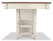 Ashley Furniture Bolanburg counter height dining table with a wood finish and sturdy legs, ideal for casual dining spaces.