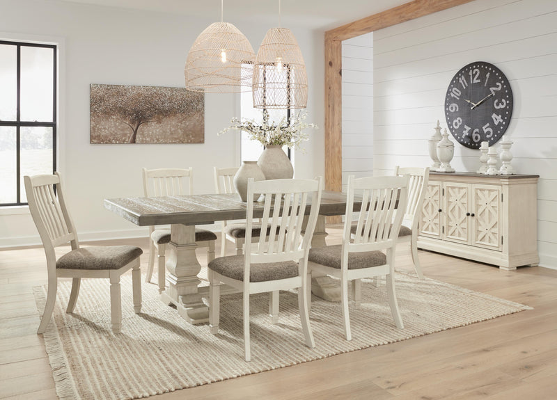 Ashley Furniture Bolanburg dining room set with a rectangular table and six upholstered chairs in a modern wood finish.