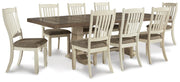 Ashley Furniture Bolanburg dining room set with a wooden table and six matching chairs, shown in a modern dining space.
