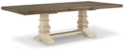 Ashley Furniture Bolanburg dining room set with a wooden table and matching chairs, shown from an angled side view.
