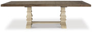 Ashley Furniture Bolanburg dining room set with a wooden table and matching chairs, shown from a head-on view.