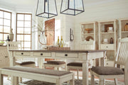 Ashley Furniture Bolanburg dining table with a wooden top and sturdy legs, perfect for family meals and gatherings.