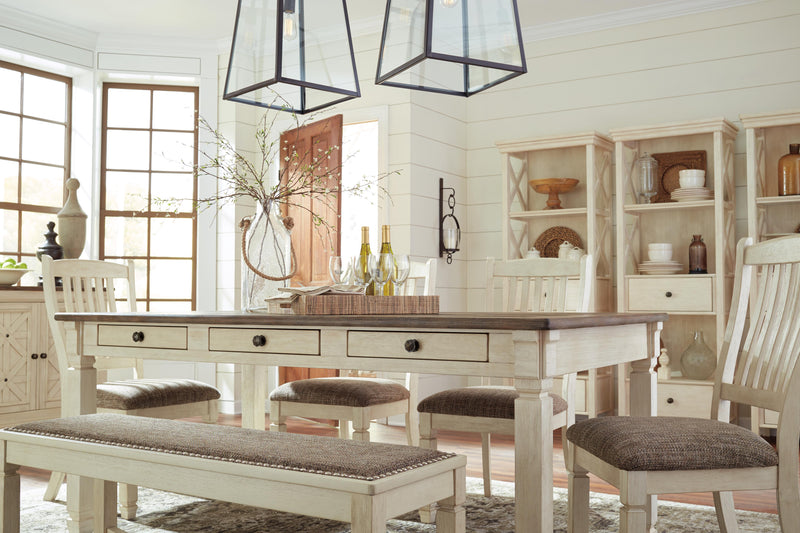 Ashley Furniture Bolanburg dining table with a wooden top and sturdy legs, perfect for family meals and gatherings.