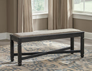 Ashley Furniture Tyler Creek dining room set with a wooden table and six matching chairs in a modern kitchen setting.