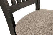 Ashley Furniture Tyler Creek Dining Set with a sturdy wooden table and matching chairs, detailed close-up of the elegant dining room design.