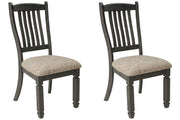 Ashley Furniture Tyler Creek dining chair set featuring four sturdy wooden chairs with upholstered seats and stylish design.
