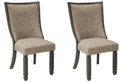 Ashley Furniture Tyler Creek dining chair set with upholstered seats and wooden legs, shown in a modern dining room setting.