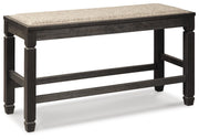 Ashley Furniture Tyler Creek counter height dining set with a round wooden table and matching chairs, angled view.