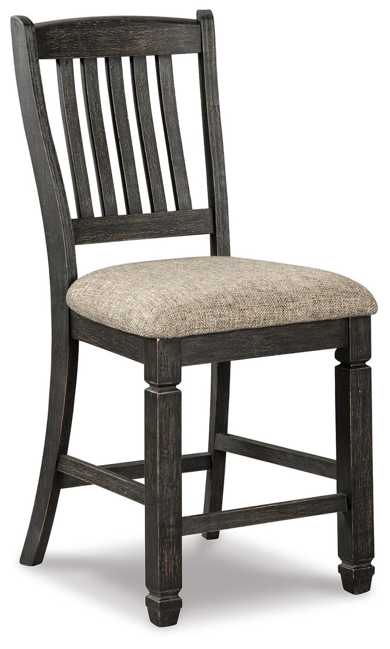 Ashley Furniture Tyler Creek counter height dining set with a table and matching chairs in a modern dining room setting.
