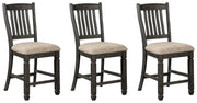 Ashley Furniture Tyler Creek counter height dining set with a table and matching chairs in a modern design.
