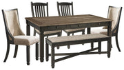 Ashley Furniture Tyler Creek dining room set with a wooden table and matching chairs, featuring a warm brown finish.