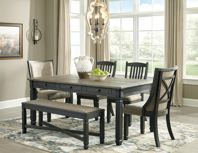 Ashley Furniture Tyler Creek Dining Set with a wooden table and matching chairs in a modern dining room setting.