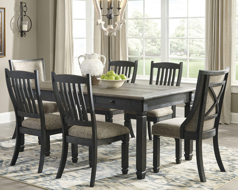 Ashley Furniture Tyler Creek dining room set with a wooden table and six matching chairs, shown in a modern dining space.