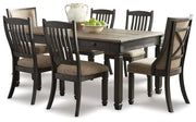 Ashley Furniture Tyler Creek dining room set featuring a wooden table and matching chairs in a warm finish.