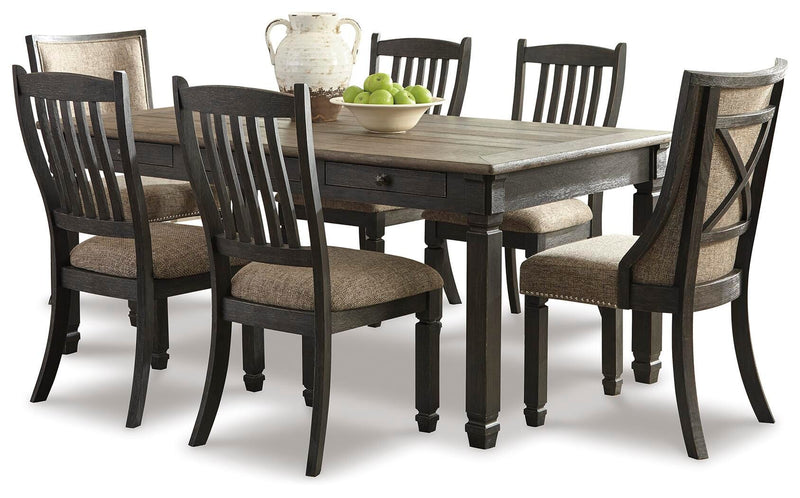 Ashley Furniture Tyler Creek dining room set featuring a wooden table and matching chairs in a warm finish.