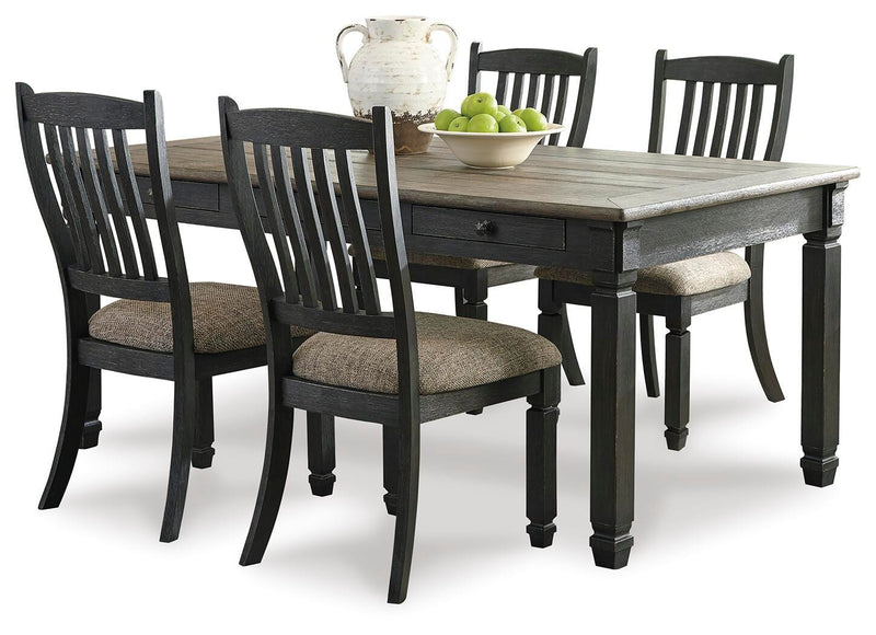 Ashley Furniture Tyler Creek Dining Set with a wooden table and matching chairs in a modern dining room setting.