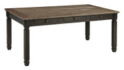 Ashley Furniture Tyler Creek Dining Set with table and six chairs, dark wood finish, ideal for a modern dining room.