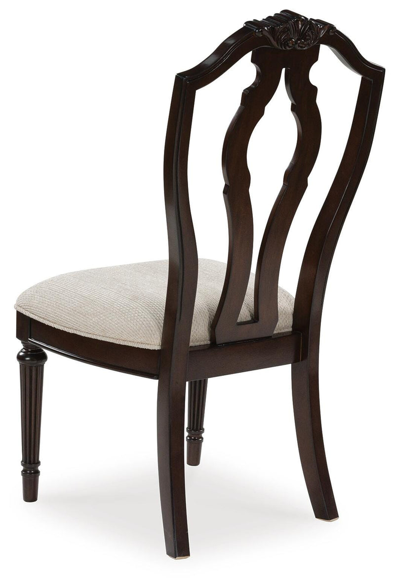 Ashley Furniture Lavinton dining chair showing a dark wood frame and upholstered seat with a high backrest.