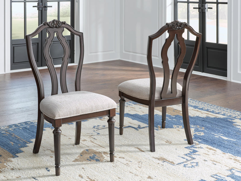 Ashley Furniture Lavinton dining chair with upholstered seat and wooden legs, shown from a side angle.