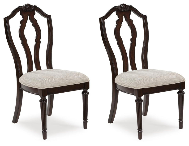 Ashley Furniture Lavinton dining chair with upholstered seat and wooden legs, shown from an angled side view.