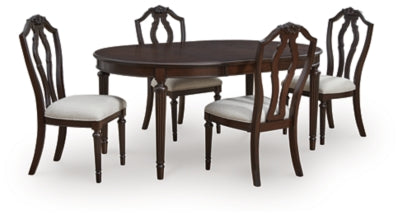 Ashley Furniture Lavinton dining room set with a wooden table and matching chairs in a modern dining package display.
