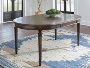 Ashley Furniture Lavinton dining extension table with a wooden surface and sturdy legs, suitable for family meals and gatherings.