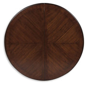 Ashley Furniture Lavinton dining extension table with wood finish and leaf extension, shown with the table top and leaf in place.