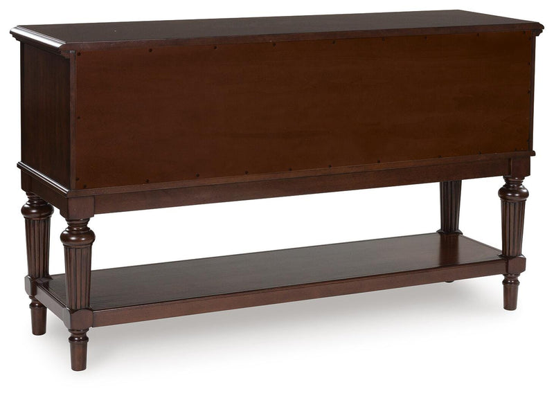 Ashley Furniture Lavinton dining server with dark wood finish, featuring multiple drawers and cabinets for storage.