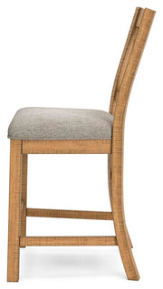 Ashley Furniture Havonplane counter height barstool with wooden legs and a cushioned seat, shown from the side view.
