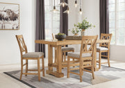 Ashley Furniture Havonplane counter height barstool with wooden frame and cushioned seat, shown from the side with a leaf-patterned backrest.
