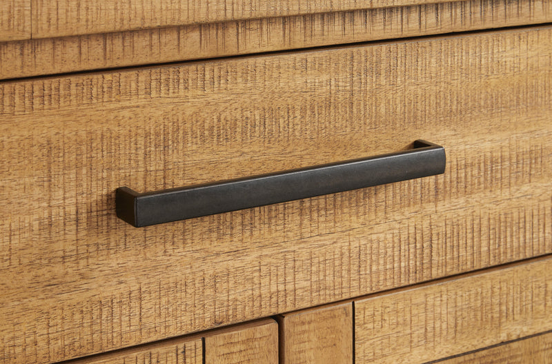 Ashley Furniture Havonplane dining server with detailed handle design, featuring a sleek wooden finish and storage display.