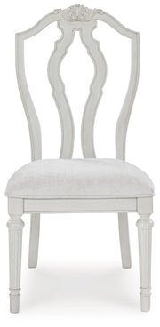 Ashley Furniture Montelaine dining chair with upholstered seat and back, featuring elegant wooden legs and a classic design.